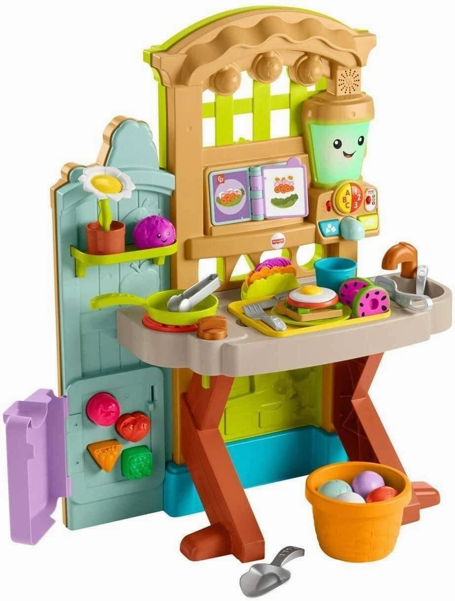 Fisher-Price Laugh and Learn Grow-the-Fun Garden to Kitchen